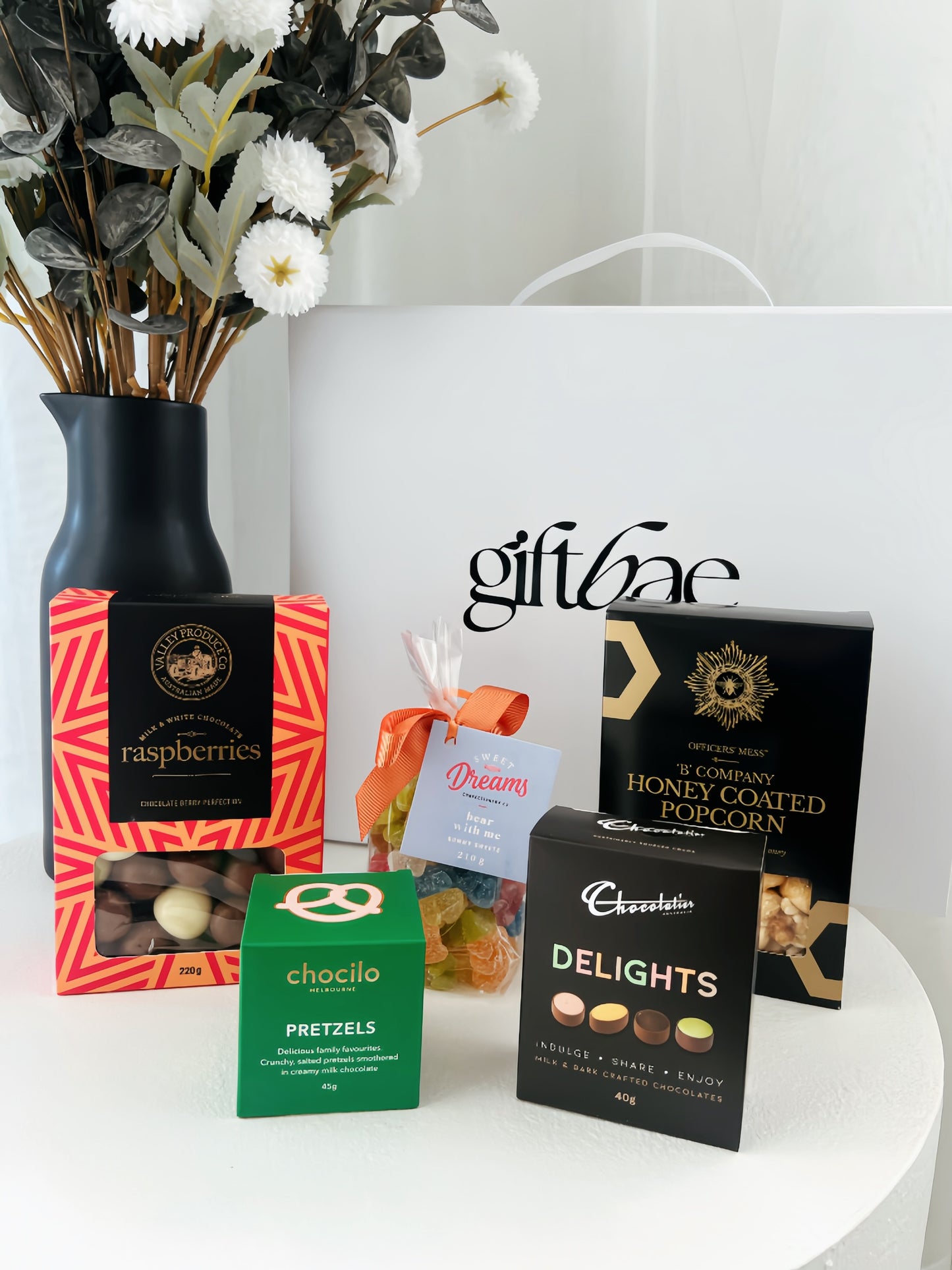 Luxury gift hampers Australia – beautifully curated gourmet hampers, wine gift boxes, and pamper hampers for all budgets. Perfect for birthdays, anniversaries, corporate gifts & special occasions. Gift Bae offers Perth same-day delivery & Australia-wide shipping. Shop the best gift hampers online today!