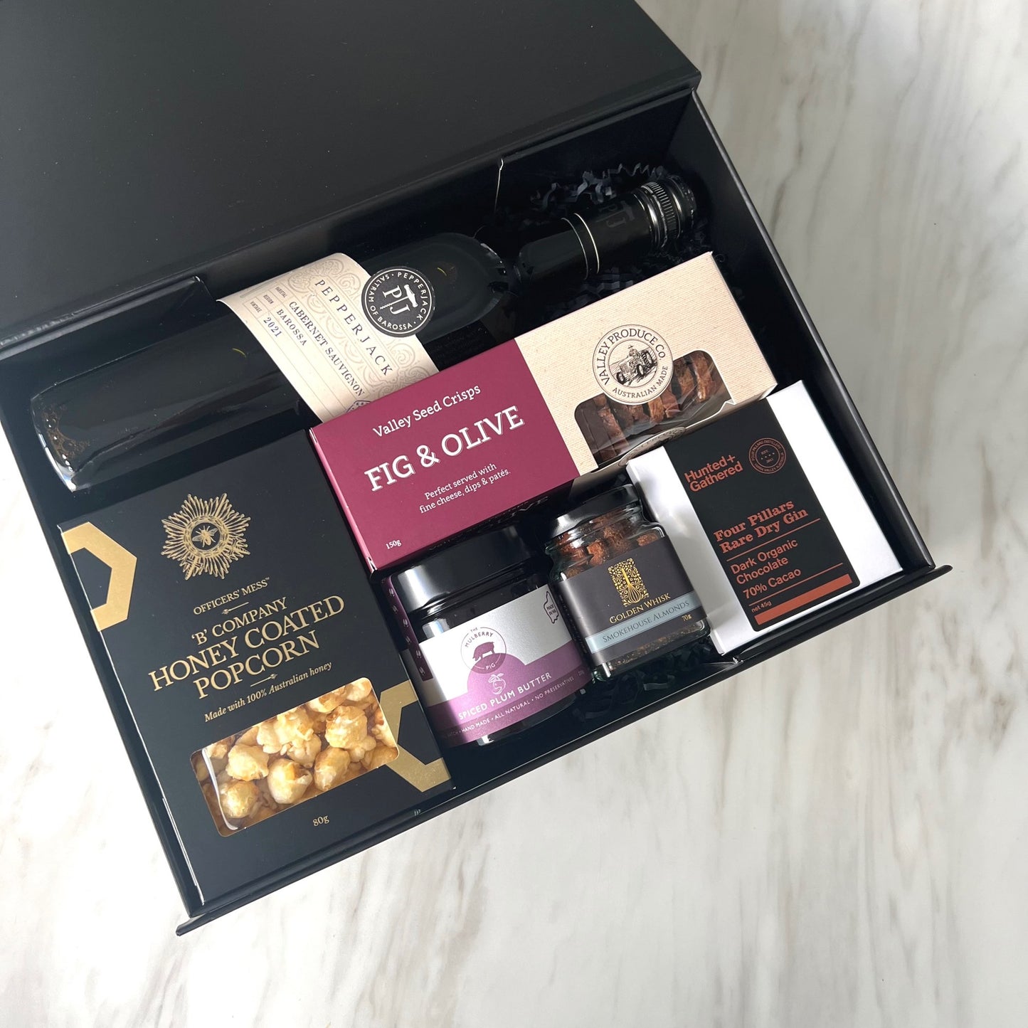 Luxury gift hampers Australia – beautifully curated gourmet hampers, wine gift boxes, and pamper hampers for all budgets. Perfect for birthdays, anniversaries, corporate gifts & special occasions. Gift Bae offers Perth same-day delivery & Australia-wide shipping. Shop the best gift hampers online today!