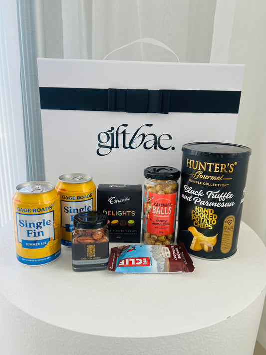 The Man Cave Hamper | Luxury gift hampers Australia – beautifully curated gourmet hampers, wine gift boxes, and pamper hampers for all budgets. Perfect for birthdays, anniversaries, corporate gifts & special occasions. Gift Bae offers Perth same-day delivery & Australia-wide shipping. Shop the best gift hampers online today!