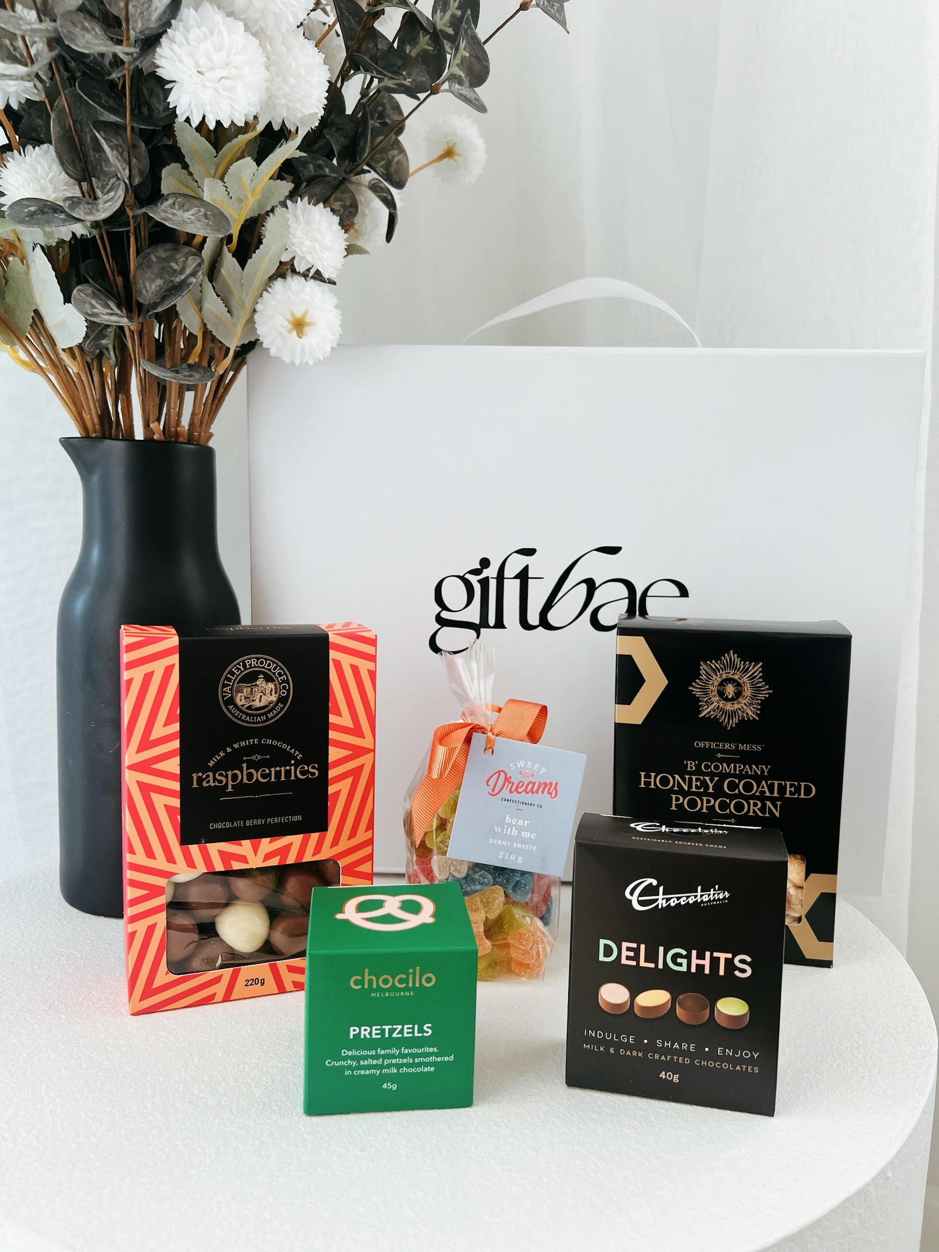 Luxury gift hampers Australia – beautifully curated gourmet hampers, wine gift boxes, and pamper hampers for all budgets. Perfect for birthdays, anniversaries, corporate gifts & special occasions. Gift Bae offers Perth same-day delivery & Australia-wide shipping. Shop the best gift hampers online today!