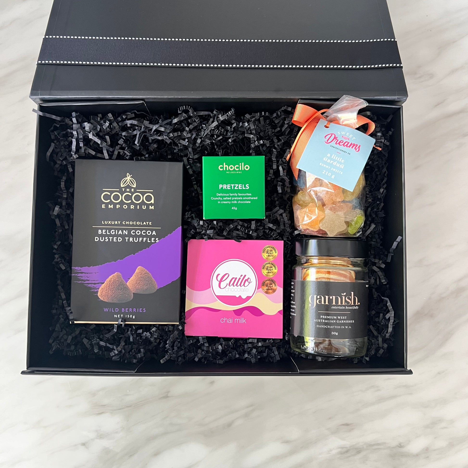 Luxury gift hampers Australia – beautifully curated gourmet hampers, wine gift boxes, and pamper hampers for all budgets. Perfect for birthdays, anniversaries, corporate gifts & special occasions. Gift Bae offers Perth same-day delivery & Australia-wide shipping. Shop the best gift hampers online today!