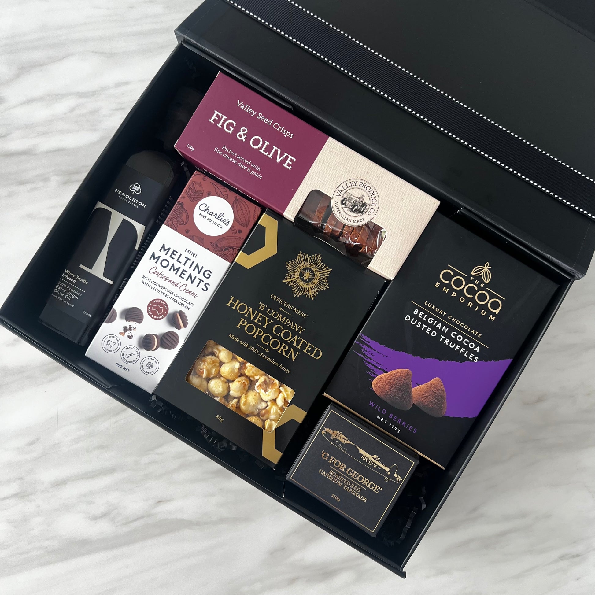 Luxury gift hampers Australia – beautifully curated gourmet hampers, wine gift boxes, and pamper hampers for all budgets. Perfect for birthdays, anniversaries, corporate gifts & special occasions. Gift Bae offers Perth same-day delivery & Australia-wide shipping. Shop the best gift hampers online today!