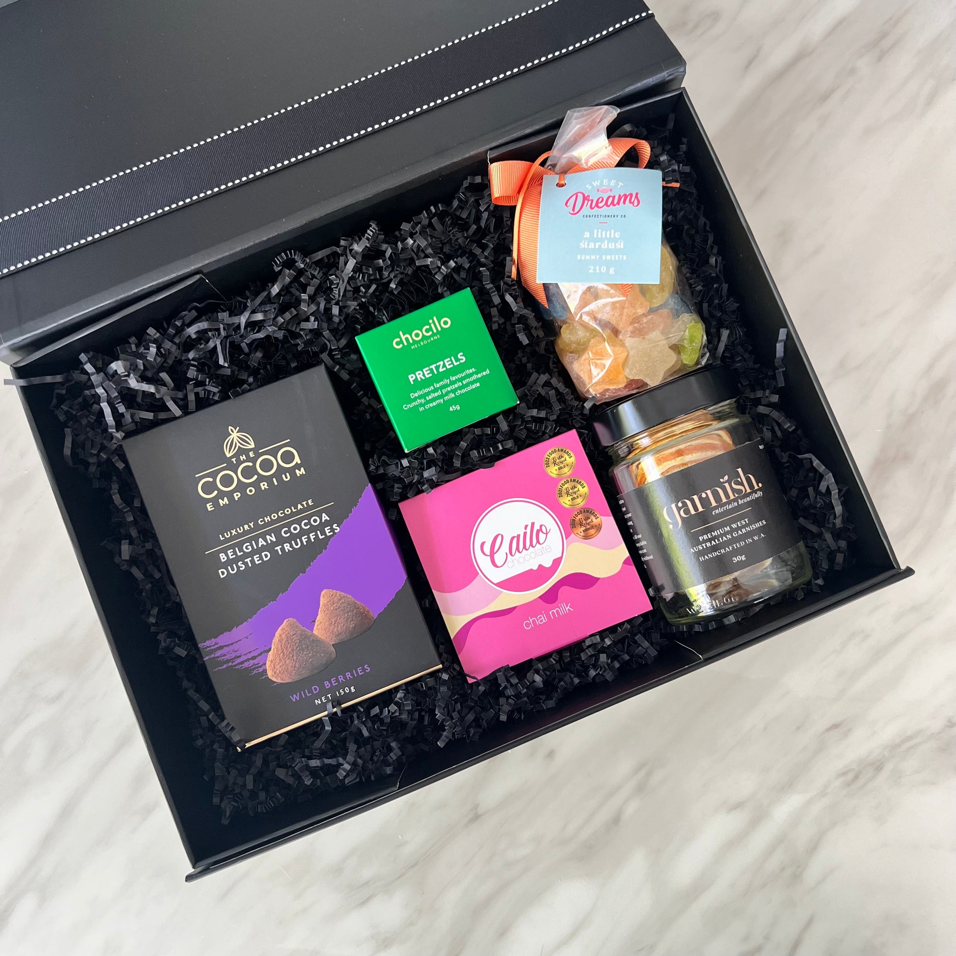 Luxury gift hampers Australia – beautifully curated gourmet hampers, wine gift boxes, and pamper hampers for all budgets. Perfect for birthdays, anniversaries, corporate gifts & special occasions. Gift Bae offers Perth same-day delivery & Australia-wide shipping. Shop the best gift hampers online today!