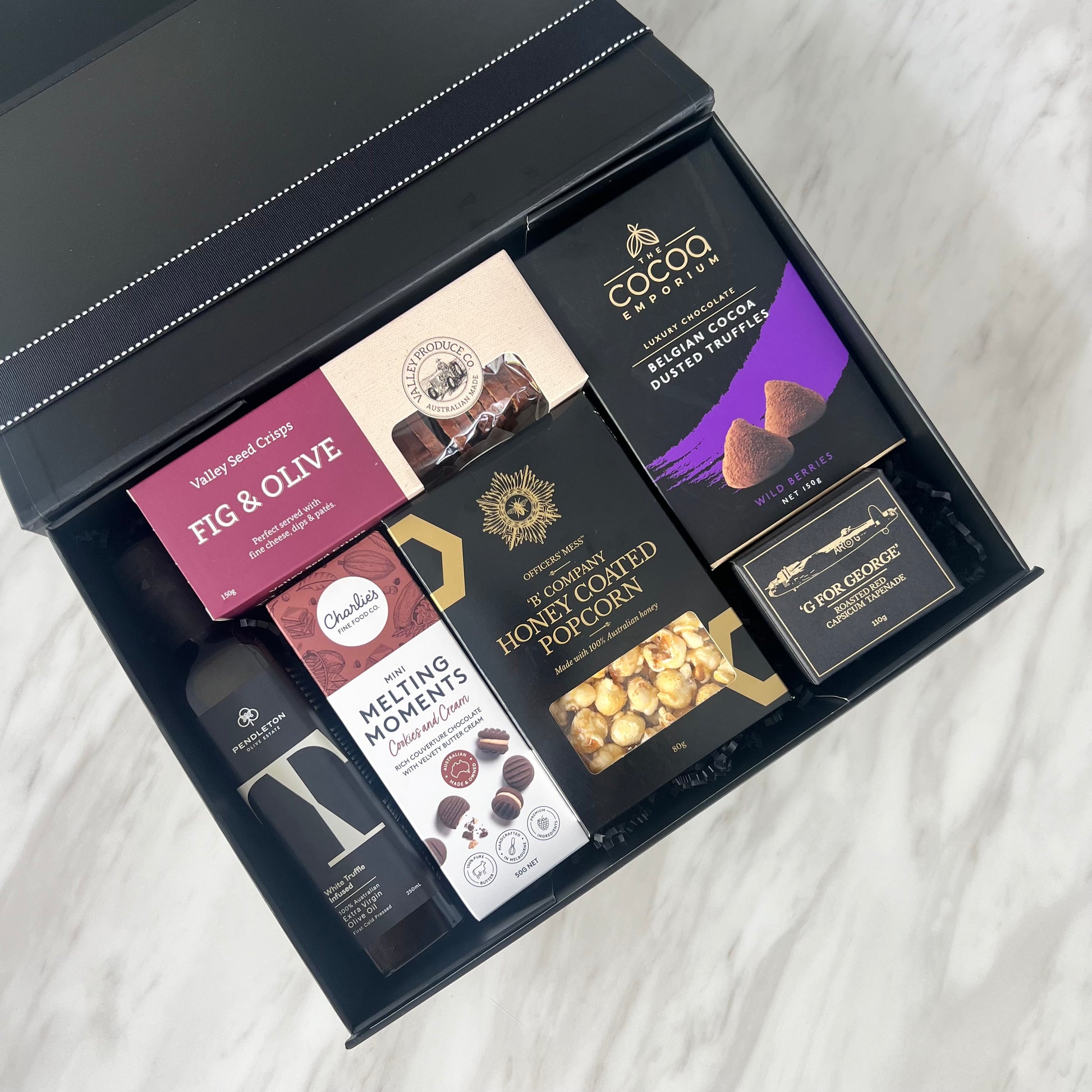 Luxury gift hampers Australia – beautifully curated gourmet hampers, wine gift boxes, and pamper hampers for all budgets. Perfect for birthdays, anniversaries, corporate gifts & special occasions. Gift Bae offers Perth same-day delivery & Australia-wide shipping. Shop the best gift hampers online today!