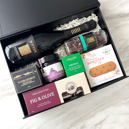 Luxury gift hampers Australia – beautifully curated gourmet hampers, wine gift boxes, and pamper hampers for all budgets. Perfect for birthdays, anniversaries, corporate gifts & special occasions. Gift Bae offers Perth same-day delivery & Australia-wide shipping. Shop the best gift hampers online today!