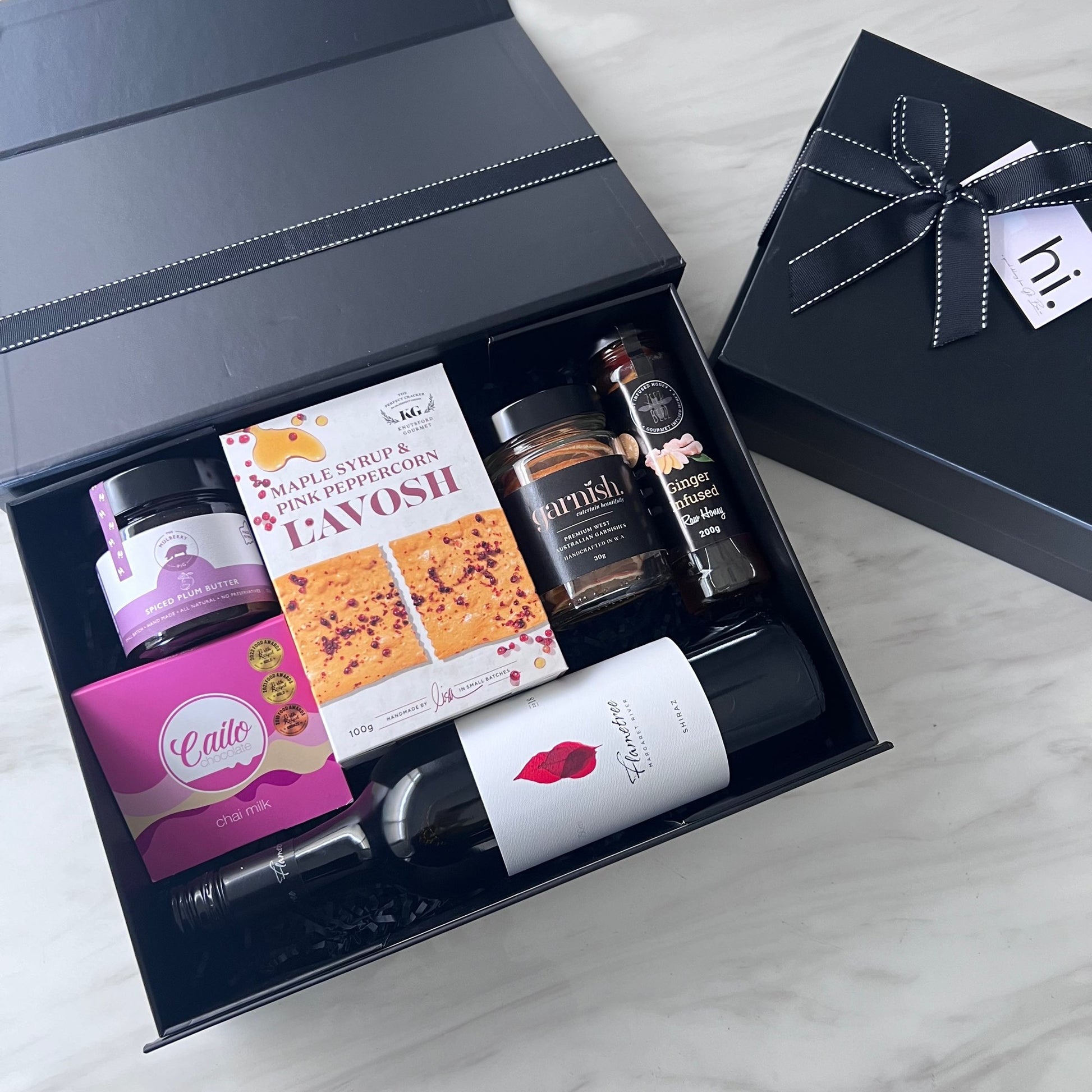 Luxury gift hampers Australia – beautifully curated gourmet hampers, wine gift boxes, and pamper hampers for all budgets. Perfect for birthdays, anniversaries, corporate gifts & special occasions. Gift Bae offers Perth same-day delivery & Australia-wide shipping. Shop the best gift hampers online today!
