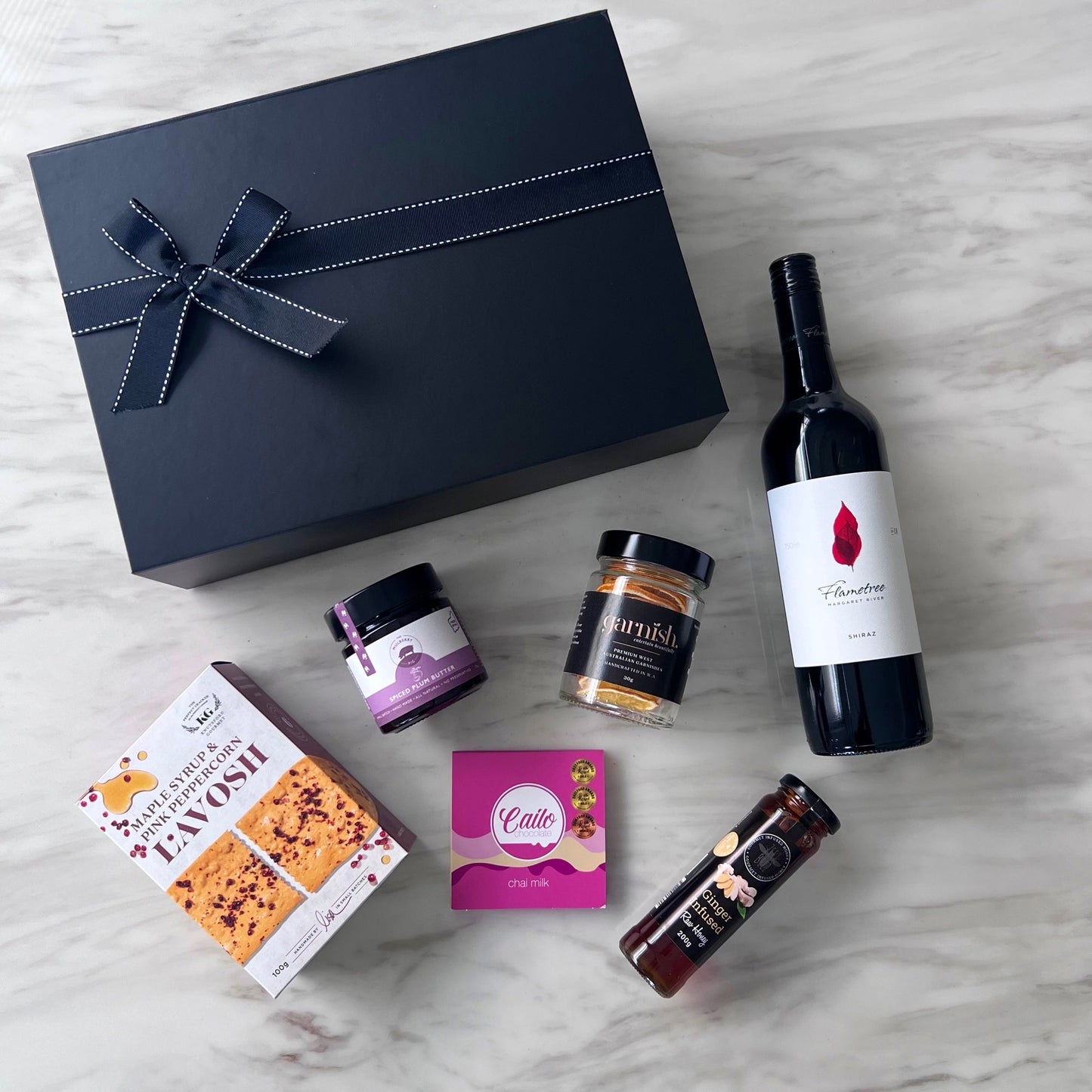 Luxury gift hampers Australia – beautifully curated gourmet hampers, wine gift boxes, and pamper hampers for all budgets. Perfect for birthdays, anniversaries, corporate gifts & special occasions. Gift Bae offers Perth same-day delivery & Australia-wide shipping. Shop the best gift hampers online today!